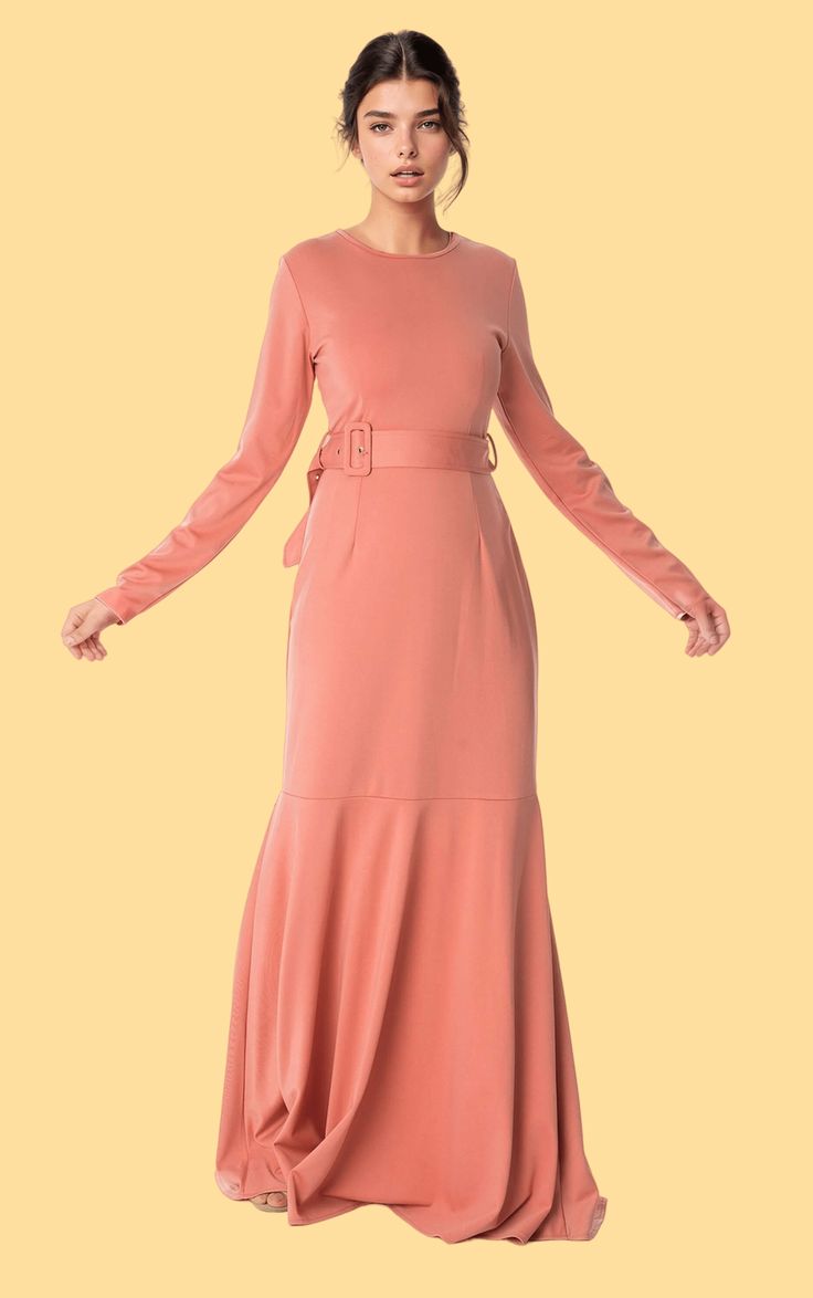 Blush classic silhouette modest dress Kabayare Modest Long Sleeve Maxi Dress, Fitted Maxi Dress With Ruffle Hem, Solid Color Belted Maxi Dress, Solid Colored Belted Maxi Dress, Modest Fitted Maxi Dress, Fitted Modest Maxi Dress, Modest Maxi Dress With Modesty Panel, Fitted Midi Length Maxi Dress With Ruffle Hem, Fitted Midi Maxi Dress With Ruffle Hem