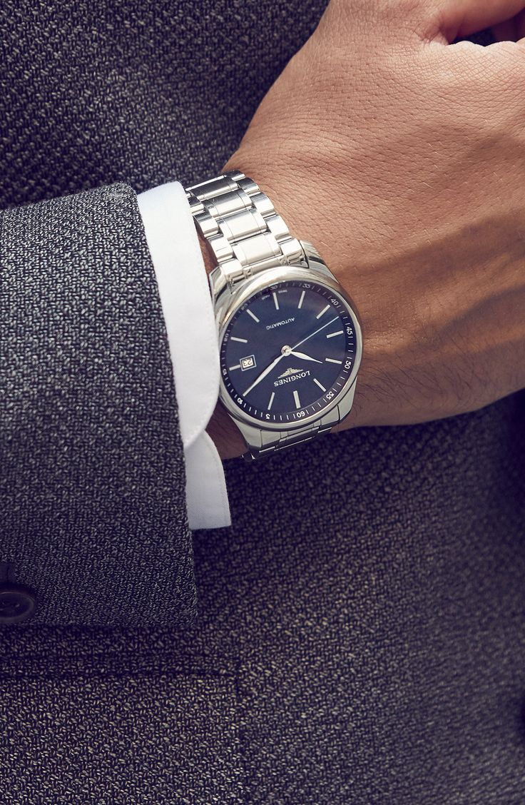 Slim stick indexes and graceful hands detail the rich blue sunray dial of a refined stainless-steel watch impeccably crafted in Switzerland with a precision automatic movement. A dual-finish bracelet completes the sleek and versatile style. Style Name:Longines Master Automatic Bracelet Watch, 40mm. Style Number: 5462269. Available in stores. Silver Watch Aesthetic, Graceful Hands, Longines Watch Men, Classy Watch, Longines Watch, Rolex Watches For Men, Men's Watches Luxury, Blue Watches, Hand Watch