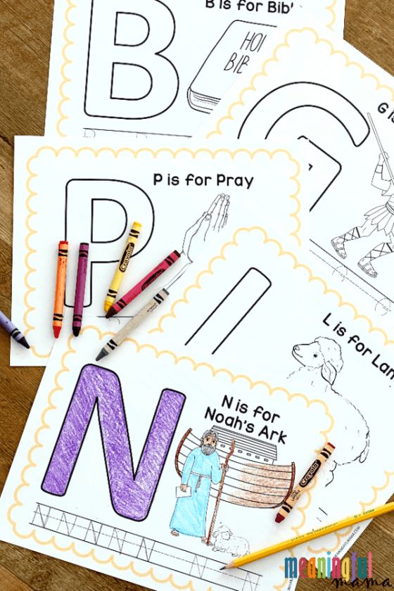 printable alphabet worksheets with crayons and pencils next to them