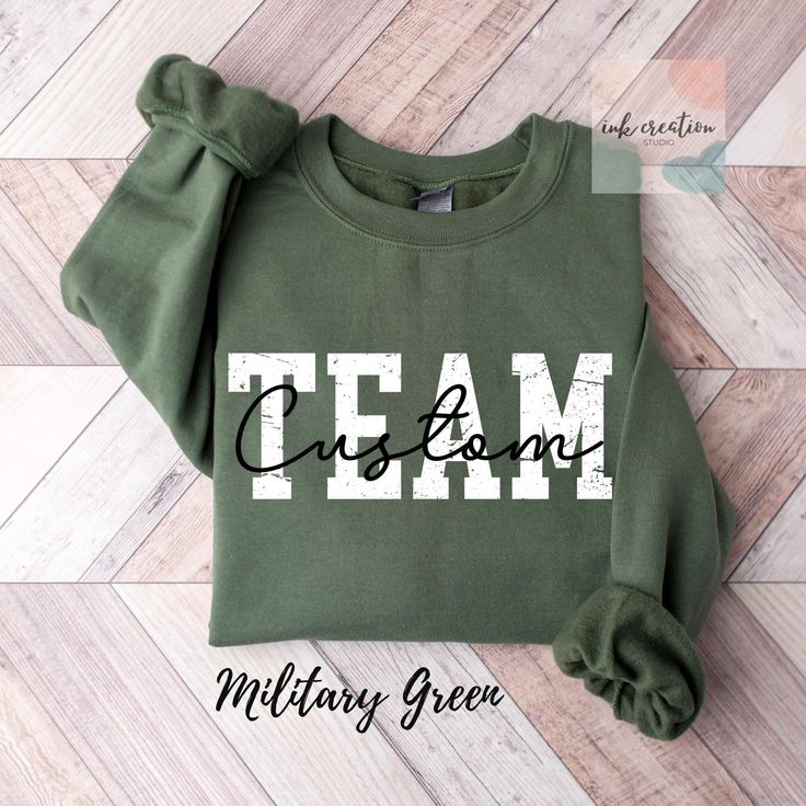 Custom Team Name Sweatshirt, Custom Best Team Ever Sweatshirt, Teammate Team Member Sweatshirt, Work Team Company Sweatshirt, Coworker Gifts Same Design on Comfort Colors Tshirt: https://www.etsy.com/listing/1789868129/comfort-colors-custom-team-name-shirt Same Design on Bella And Canvas Tshirt: https://www.etsy.com/listing/1775671950/custom-team-name-shirt-custom-teammate ❤ Gildan Brand Sweatshirts & Unisex Adult Sizing Our Unisex Heavy Blend Crewneck Sweatshirt is all about cozy comfort and effortless style. Made from a lovely blend of polyester and cotton, it keeps your favorite designs looking fresh and beautiful. The absence of itchy side seams means you'll stay cozy and irritation-free. Perfect for layering or wearing on its own, this sweatshirt is your go-to for a relaxed, feminine Cheap Sports Fan Sweatshirt With Team Name, Cheap Sweatshirt With Team Logo For Fans, Cheap Crew Neck T-shirt With Team Name, Green Casual Tops For Team Events, Casual Green Top For Team Events, Green Long Sleeve T-shirt With Team Name, Green Crew Neck T-shirt For Team Events, Casual Sweatshirt With Team Name For Team Events, Cotton Crew Top With Team Name