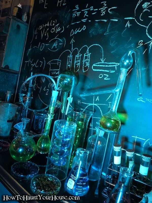 the science lab is full of glassware and flasks with writing on it