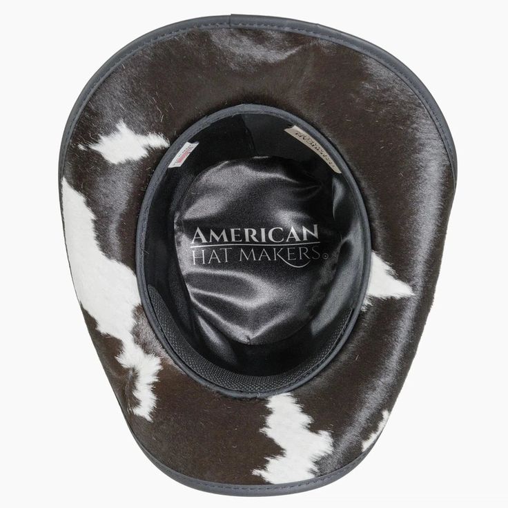 Pinto | Mens Leather Cowboy Hat with Calf Accents blends rugged cowhide and hair-on calfskin for a distinctive, bold look. The triple-braided band with tassel adds a unique touch, making this Outback hat perfect for outdoor adventures. Material: Genuine Leather with Hair-On Calfskin Shape: Outback Trim: Triple-Braided Band with Tassel Brim Size: 3” Crown Height: 4” Sweatband: AHM Velcro Assembled in the USA Country Style Fur Felt Hat Bands For Country Events, Kentucky Derby Leather Hats With Short Brim, Country Style Leather Hat Bands For Rodeo, Western Fedora With Short Brim For Themed Events, Wide Brim Leather Hat For Kentucky Derby, Western Style Fedora With Short Brim For Western-themed Events, Western Style Leather Hat With Short Brim, Leather Wide Brim Hat For Kentucky Derby, Western Style Top Hat With Short Brim For Rodeo