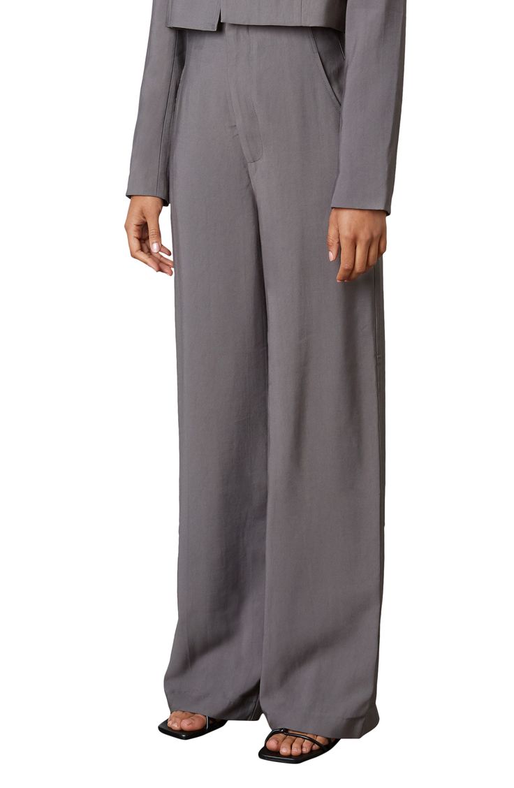 A baggy fit defines these trousers styled with straight legs. 30" inseam; 11 1/4" leg opening; 13 1/2" front rise; 16 3/4" back rise 94% rayon, 6% polyester Dry clean Imported Versatile High-waisted Viscose Pants, Loosely Fitted Viscose Wide Leg Pants, Wide Leg Pants With Pockets And Straight Hem, Relaxed Fit Viscose Wide-leg Pants, Wide Leg Viscose Bottoms, Spring Workwear Wide Leg Viscose Pants, Solid Wide-leg Viscose Pants, Spring Workwear Viscose Wide Leg Pants, Solid Viscose Wide-leg Pants