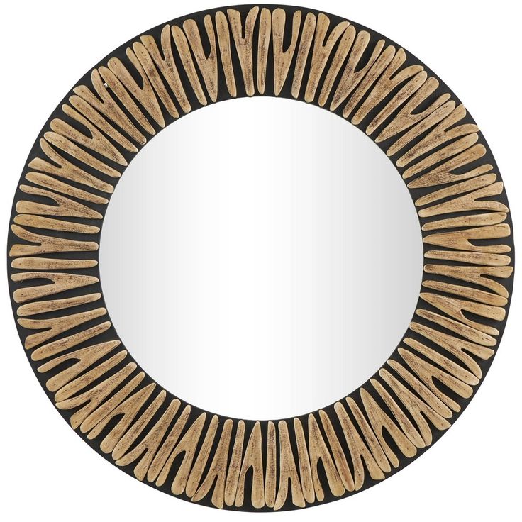 a round mirror with black and gold accents