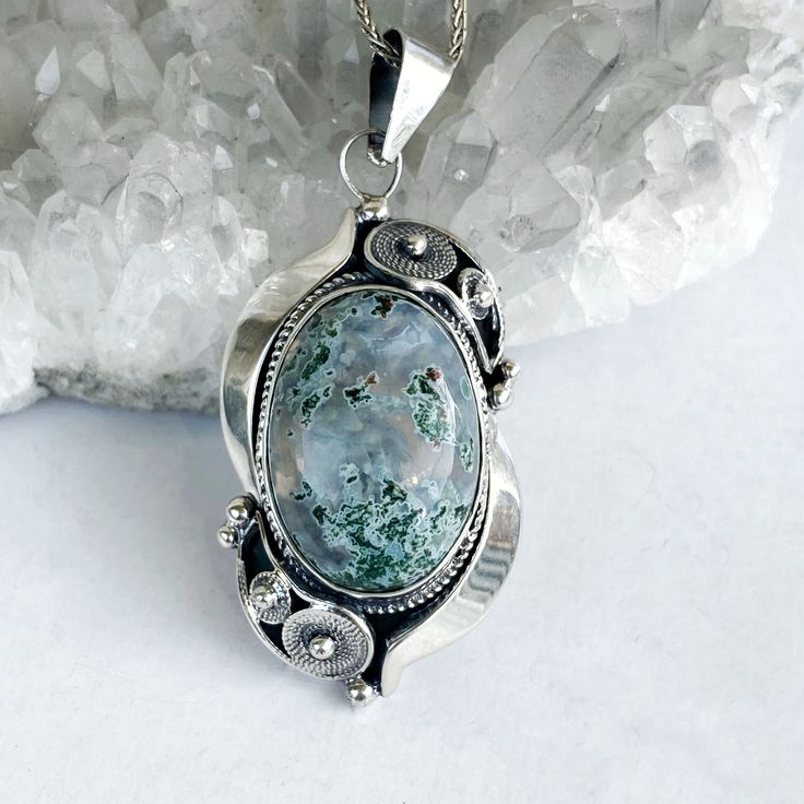 Armenian jewelry moss agate pendant Filigree necklace sterling silver made in Armenia birthday gifts for her All our jewelry is made of high-quality sterling silver and is stamped with a 925 stamp Pendant weight: 10.8 gr ⦿ Attention: The color of the stones may differ due to a difference between monitors ◦* ◦* ◦* ◦* ◦* ◦* ◦* ◦* ◦* ◦* ◦* ◦* ✔️ Please, view my store policies before buying this item here. https://www.etsy.com/shop/shahinianjewelry/policy For more information, ➩You can also look at Silver Moss Agate Pendant Necklaces, Unique Moss Agate Silver Necklace, Unique Silver Moss Agate Necklace, Silver Moss Agate Necklace As A Gift, Silver Moss Agate Pendant Necklace, Silver Moss Agate Necklaces As Gift, Silver Moss Agate Necklaces For Gifts, Silver Oval Bohemian Necklaces, Sterling Silver Jewelry With Large Healing Pendant