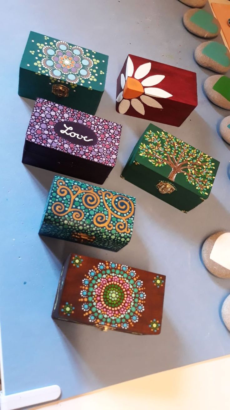 several colorful boxes sitting on top of a table