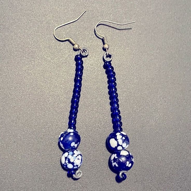 Handmade Blue Bead Earrings Metal Inside Is Inflexible, Rigid. So These Will Swing , Not Bend. These Are Ooak - One Of A Kind, Never To Be Re-Created, Because I Ran Out Of The Speckled Glass Beads In Blue. Crafted By Hand, Injuries Sustained While Using Pliers To Make These Lol Speckled Glass Beads Are Left Over From The Bracelet I Had A Decade Ago, In The Small Beads Are From A Bag I Got At The Thrift Store. Marking As Nwt Despite Upcycled Components. Lmk If You Want This Wrapped Like A Gift. Blue Round Beaded Earrings, Blue Large Beads Dangle Earrings, Blue Large Beaded Dangle Earrings, Blue Round Beaded Earrings With Colorful Beads, Blue Adjustable Beaded Earrings For Pierced Ears, Adjustable Blue Beaded Earrings For Pierced Ears, Handmade Adjustable Blue Earrings, Adjustable Blue Earrings With Large Beads, Blue Beaded Drop Earrings With Large Beads