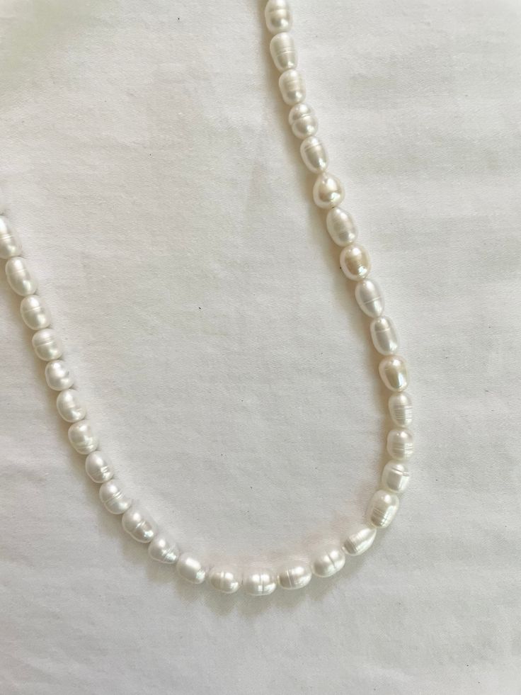 ‣ handmade necklace with freshwater pearls ‣ 14 inches with 2 inch extender Classic Long Pearl Necklace With Charm, Everyday Pearl Necklaces With Round Beads, Everyday Single Strand Pearl Necklace With Round Beads, Everyday Single Strand Pearl Necklace, Everyday Beaded Pearl Necklace, Everyday Beaded Pearl White Pearl Necklace, Classic Pearl Pendant Choker Necklace, Everyday Pearl Beaded Necklace, Everyday White Single Strand Pearl Necklace