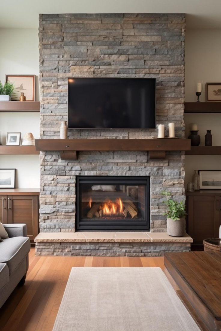 a living room with a couch, fireplace and television