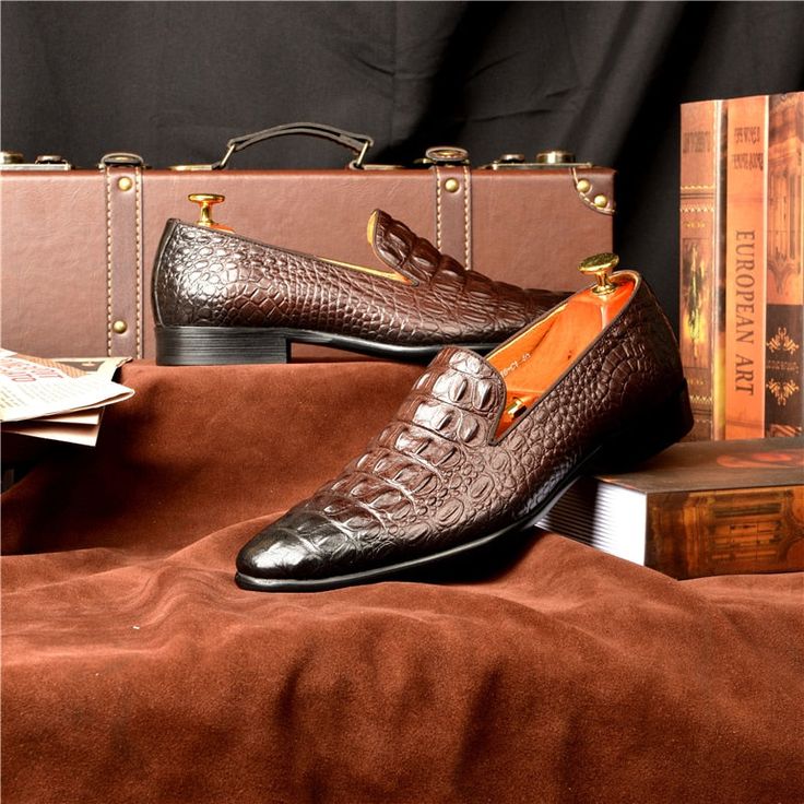 Step into a world of luxury and sophistication with our exquisite Luxury CrocTex Pointed Toe Slip-On Loafers. Crafted with the finest quality genuine leather, these loafers are designed to elevate your footwear game to new heights. With their elegant brogue shoe type, solid pattern type, and sleek pointed toe shape, these loafers are perfect for both formal and casual occasions. Experience maximum comfort and support with the soft and breathable cow leather lining and full grain leather insole. The rubber outsole provides excellent traction and durability, ensuring steady steps wherever you go. Elevate your footwear collection and make a statement with our Luxury CrocTex Pointed Toe Slip-On Loafers. Luxury Slip-on Leather Shoes For Business, Luxury Brown Slip-on Moccasins, Luxury Slip-on Dress Shoes With Textured Sole, Luxury Business Slip-ons With Almond Toe, Luxury Semi-formal Slip-on Moccasins, Luxury Brown Slip-ons With Textured Sole, Luxury Slip-on Dress Shoes For Business Casual, Office Dress Shoes With Brown Crocodile Pattern, Brown Crocodile Pattern Dress Shoes For Office