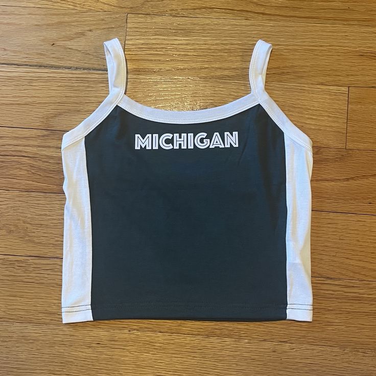 White and green Michigan cropped tank! Perfect for tailgating or showing spirit! Michigan State Football, Womens Tank Tops, University Of Michigan, Gameday Outfit, Michigan State, Pretty Clothes, Fit Ideas, Womens Tank, Crop Tank