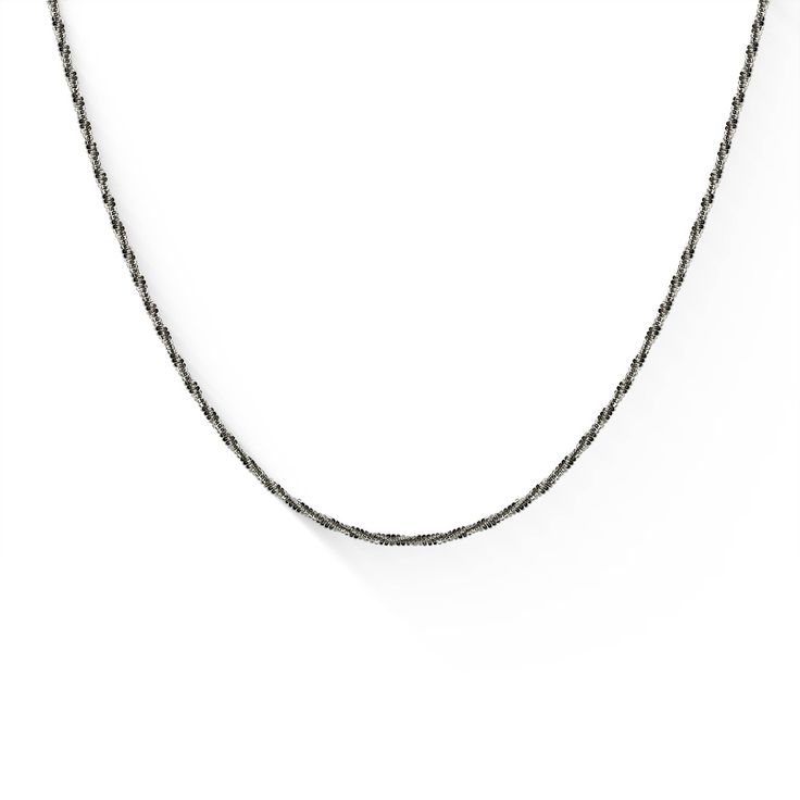 14K White Gold Adjustable Sparkle Chain. The chain adjusts up to approximately 22" in length and measures approximately 1.1mm in width. Classic Rope Chain Necklace With Delicate Link, Minimalist 14k Gold Rope Chain Necklace, Minimalist Rope Chain Link Jewelry, 14k Gold Silver Chain Necklace With Delicate Chain, 14k Gold Delicate Silver Chain Necklace, 14k Gold Delicate Chain Necklace In Silver, Silver 14k Gold Rope Chain Necklace, Minimalist Sterling Silver Rope Chain Necklace, Palm Tree Jewelry