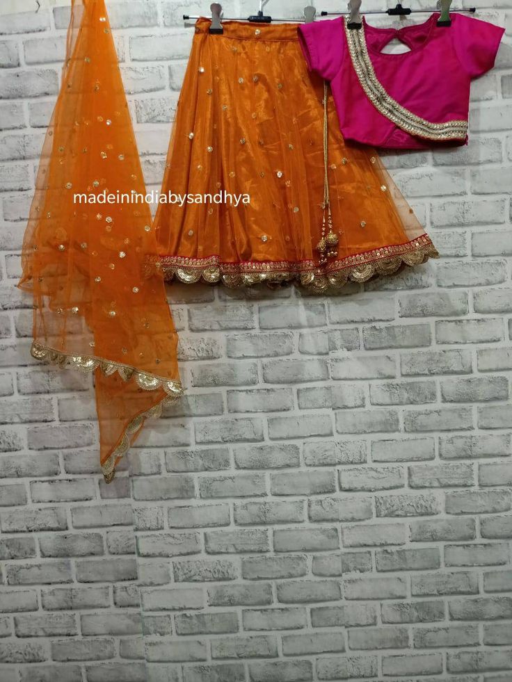 Product: Custom made girl kids dress. Fabric: Lehenga- net and silk with gota work border Top -silk Dupatta - net embroidered Delivery Time : Please keep me informed for any dates or times frame you keeping in mind. Chanderi Sharara For Festivals, Navratri Organza Choli With Gota Work, Fitted Net Sets For Diwali, Organza Sets For Navratri Celebration, Festival Organza Sets With Pallu Detail, Orange Choli With Sheer Dupatta For Navratri, Festive Organza Anarkali Set With Self Design, Organza Choli For Diwali Celebration, Organza Choli With Pallu For Festivals