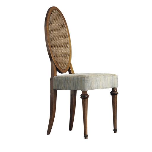 a wooden chair with a beige upholstered seat and back cushion on an isolated white background