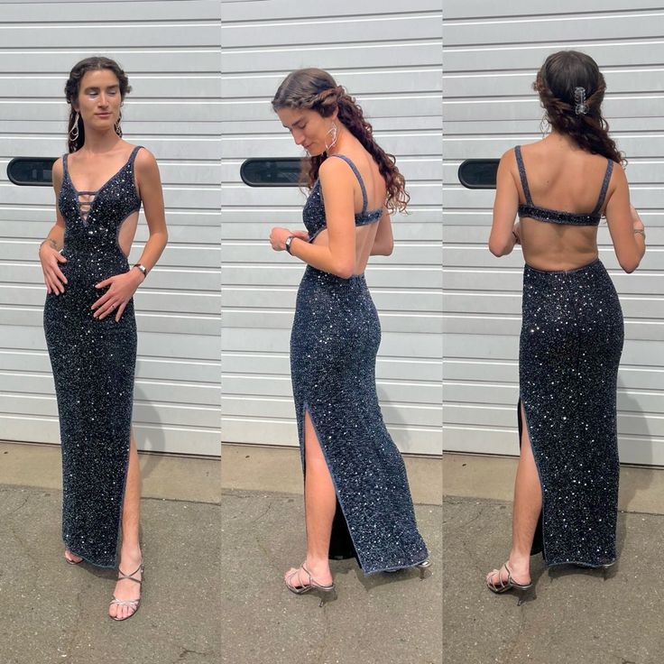 three women in long dresses standing next to each other and looking at their cell phones