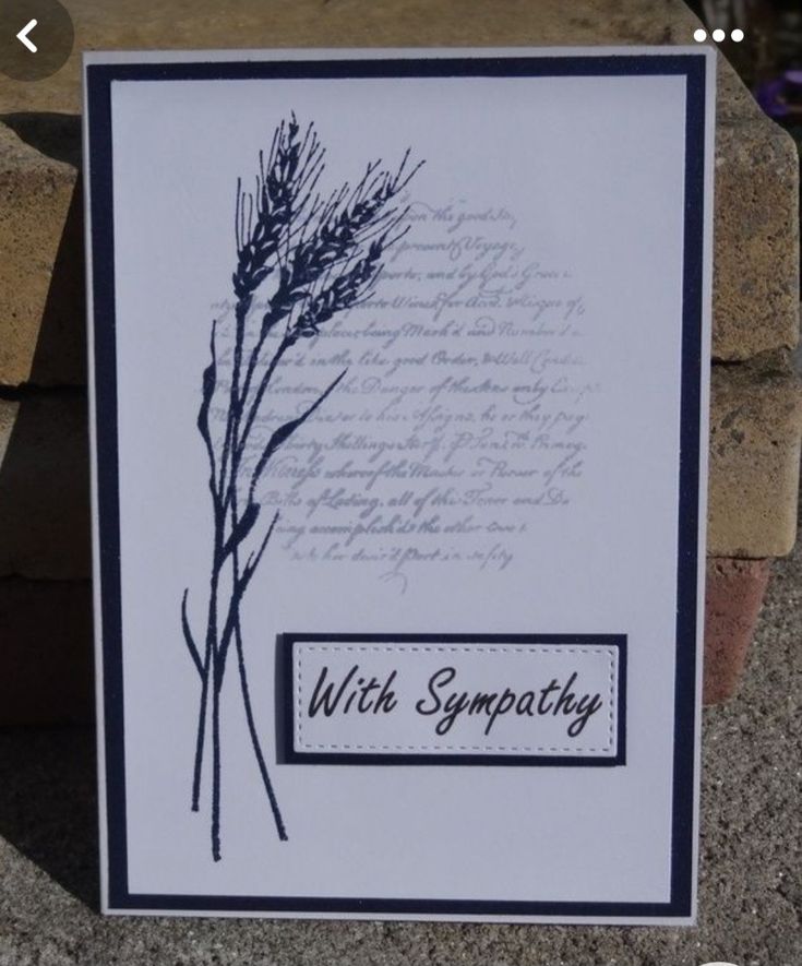 a card with some type of writing on it and a plant in the middle is shown