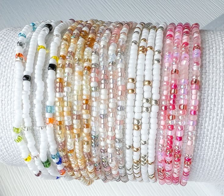 Minimalist seed bead stretch bracelets make colorful, fun friendship gifts Simple jewelry with a boho aesthetic  Single seed bead bracelets in 5 colors Purchase singles and multiples to create your unique collections.  * Tiny glass seed beads- 2-4mm! * Made from glass seed beads from around the world* * Strung on durable beading elastic. 🦋YOU MAY ALSO LIKE Daisy & Dahlia Bracelets https://etsy.me/4855PlF Best Selling Seed Bead Bracelets https://etsy.me/3Q3aO01 Tila Bracelets- https://etsy.me/3phAFHw  🦋DON'T SEE YOUR SIZE LISTED? The sizes we have listed are what we keep on hand to ship as quickly as possible We are happy to make a custom size.  Simply drop us a note to request a custom size Custom size requests are fulfilled based on supply availability 🦋 FIND THE PERFECT FIT * Measure White Stretch Bracelet For Summer Festival, White Beaded Bracelets With Tiny Beads For Festival, Summer White Heishi Beads Friendship Bracelets, Summer White Hand-strung Friendship Bracelets, Trendy White Beaded Bracelets For Festival, White Friendship Bracelets With Colorful Beads For Summer, White Summer Friendship Bracelets With Colorful Beads, Summer White Friendship Bracelets With Colorful Beads, Seed Bead Stretch Bracelets