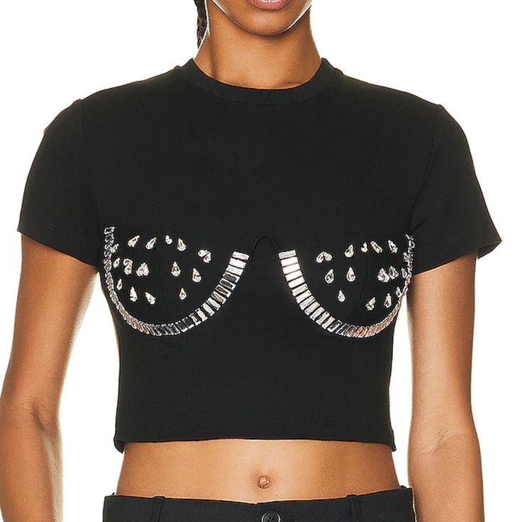 Area Iconic Top! Rare! Nwt, Never Worn - Underwire Cups With Crystal Trim Embellishment. - Bustier-Style Bodice - Crewneck, Short Sleeves - Slim Fit - Cropped Length - Hidden Zip At Side - Mid-Weight Jersey Fabric - 67% Rayon, 28% Nylon, 5% Spandex - Dry Clean - Length: Aprox 16.25” - Bust: Aprox 15” Pit To Pit Lying Flat Questions? Leave A Comment Below! Glamorous Crew Neck Summer Tops, Embellished T Shirt, Trendy Silver Short Sleeve Top, Party Crop Top T-shirt, Fitted Silver T-shirt With Short Sleeves, Trendy Silver Tops For Summer, Glamorous Fitted Silver Top, Trendy Silver Crew Neck Tops, Glamorous Silver Tops For Summer