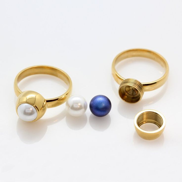 These rings are made from stainless steel. Pearl inside the ring is changeable: simply twist the locket, change the pearl and twist it again. You can be sure that the pearl you put inside the locket won't fell out. Different ring sizes are available. The best thing is that you can create new look every time by simply changing the pearl. It's a ring that will match to every outfit! Note: Swarovski 5818 Round Pearls have a hole on one side. Make sure that the side with hole goes inside the locket. Modern Jewelry With Rotating Bezel For Gift, Magnetic Metal Jewelry Gift, Modern Magnetic Jewelry For Gifts, Ring Sizes, Crystal Pearls, Stainless Steel Rings, Steel Ring, Jewelry Findings, Stones And Crystals