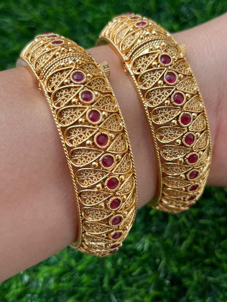 Polki Gold Plated Ruby Kundan Bangle Kada Metal Bangle With Intricate Design For Festival, Bohemian Festival Bracelets, Bohemian Round Bangle For Festive Occasions, Bohemian Round Bangle For Festivals, Elegant Jewelry With Motifs For Rituals, Bohemian Round Bracelet For Festive Occasions, Traditional Bracelets For Rituals, Adjustable Metal Temple Jewelry Bracelet, Festive Bohemian Bangle