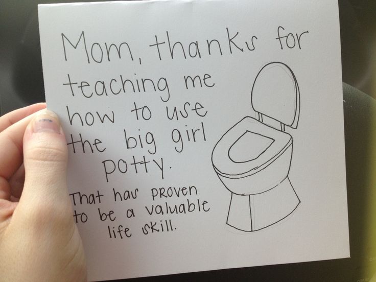 a child's hand holding up a paper with a drawing of a toilet and the words mom, thanks for teaching me how to use the big girl potty