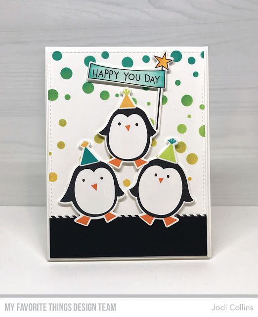 a card with two penguins holding a sign that says happy you day