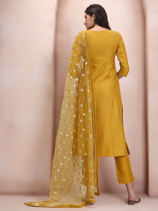 Mustard yellow & silver solid Kurta with Trousers & dupattaKurta design:SolidStraight shapeRegular styleRound neckThree-quarter regular sleevesSequinned detailCalf length with flared hemSilk blend machine weave fabricTrousers design:Solid TrousersPartially elasticated waistbandSlip-on closure Western Kurtis, Floral Gown, Organza Fabric, Kurta Designs, New Launch, Style Mistakes, Chevron Pattern, Beautiful Gowns, Chic Dress