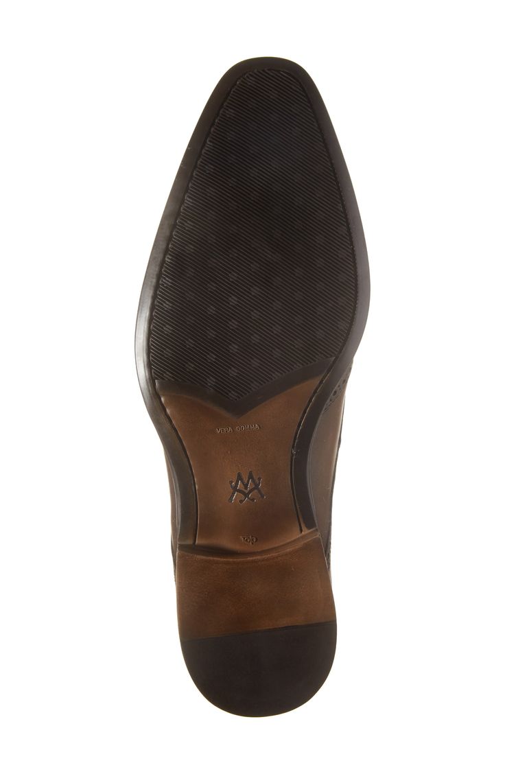 Classic broguing stipples the upper of a burnished-leather derby that adds clean grounding to your sophisticated styles. Lace-up style Cushioned footbed Leather upper and lining/rubber sole Made in Spain Business Oxfords With Perforated Plain Toe, Leather Oxfords With Perforated Toe Box For Business, Leather Oxfords With Perforated Toe Box For Semi-formal Occasions, Business Oxfords With Perforated Toe Box, Leather Oxfords With Perforated Almond Toe, Leather Oxfords With Perforated Toe Box And Almond Toe, Leather Oxfords With Perforated Toe Box For Work, Leather Monk Strap Shoes With Textured Sole For Business, Business Leather Shoes With Almond Toe