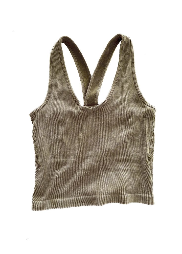 This brami is our longest style yet! The perfect combination of brami and tank with even more versatility. It's easy to wear, incredible for our long-torso girlies who need a little more length, and back smoothing. If you're looking to feel cute and comfy at the same time, this checks all the boxes! Works like a bra, fits like a tank. Built-in Extra Lining for Chest Support Fits True to Size Body-Hugging Fit and Structured Form so You Can Wear Less Layers and Still Feel Supported Longer Length V Everyday V-neck Top With Built-in Bra, V-neck Yoga Tank Top For Spring, V-neck Top With Built-in Bra For Everyday, Everyday Racerback Tops With Built-in Bra, Trendy Yoga Tops With Built-in Bra, Stretch V-neck Crop Top For Everyday, Summer Yoga V-neck Tops, Trendy Cotton Yoga Tank Top, Casual Yoga Vest Tops