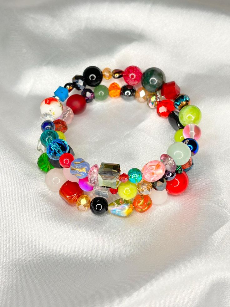 Memory Wired Bracelet consist of glass Czech beads Hand Wrapped Multicolor Crystal Bracelet, Multicolor Hand Wrapped Crystal Bracelet, Adjustable Glass Jewelry For Parties, Adjustable Glass Crystal Bracelet Gift, Adjustable Spiritual Glass Bracelets, Multicolor Czech Glass Jewelry For Party, Multicolor Glass Bracelet Jewelry, Colorful Glass Beaded Jewelry, Multicolor Czech Glass Party Jewelry