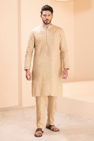 Beige linen kurta with placed dori embroidery on front yoke. Paired with a matching plain aligadhi. - Aza Fashions Wedding Linen Kurta With Resham Embroidery, Festive Fitted Linen Kurta, Designer Linen Straight Kurta, Designer Linen Kurta, Embroidered Linen Kurta, Festive Embroidered Linen Set, Linen Straight Kurta With Resham Embroidery, Straight Linen Kurta With Resham Embroidery, Linen Kurta With Resham Embroidery