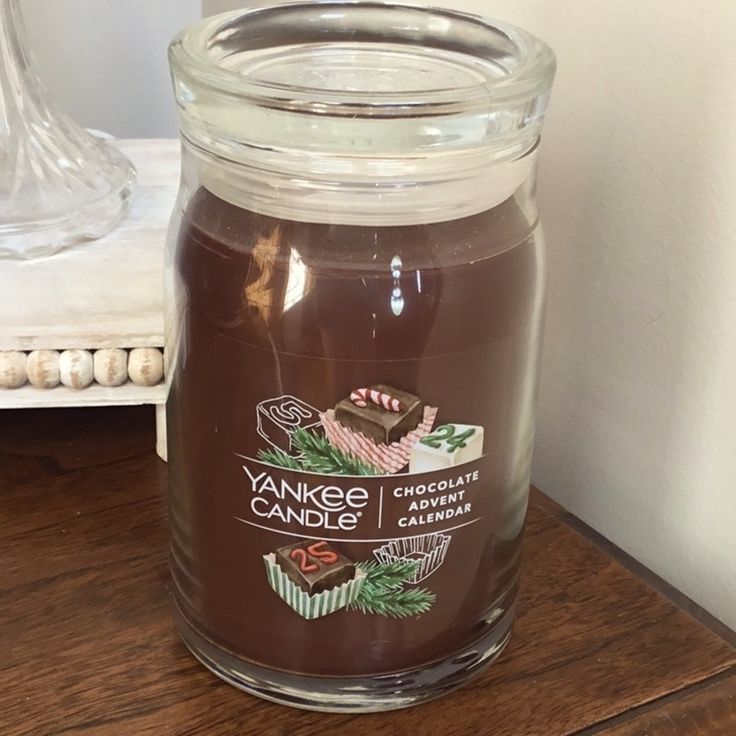 a glass jar filled with yankee candle chocolate