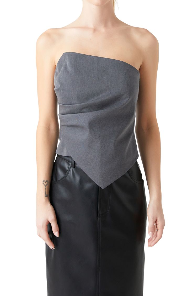 Elegant gathers beautifully drape on a shoulder-baring corset top that has an asymmetric hem for bold detail. Hidden side-zip closure Strapless 78% Tencel® lyocell, 17% rayon, 5% spandex Tencel lyocell is a sustainably produced fiber made with closed-loop processing Hand wash, line dry Imported Fitted Top With Asymmetrical Zip For Summer, Fall Sleeveless Tube Top, Chic Sleeveless Tube Top For Fall, Fitted Ruched Top With Asymmetrical Hem, Fitted Ruched Tops With Asymmetrical Hem, Elegant Fitted One Shoulder Top With Asymmetrical Hem, Fitted Sleeveless Tube Top For Fall, Fitted Top With Asymmetrical Zip For Night Out, Fitted Strapless Top For Fall