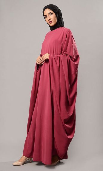 Featuring an asymmetrical and flared kaftan style abaya dress in nida fabric with pleated and elongated flowy cape style sleeves. Its a modest wear and comfortable everyday abaya dress.FIT : Relaxed fit.COMPOSITION : Nida.CARE : Dry clean only. Modest Flowy Maxi Length Abaya, Flowy Maxi-length Abaya For Eid, Flowy Long Abaya For Eid, Eid Dresses With Draped Sleeves, Flowy Abaya, Everyday Abaya, Kaftan Abaya, Kaftan Style, Cape Style