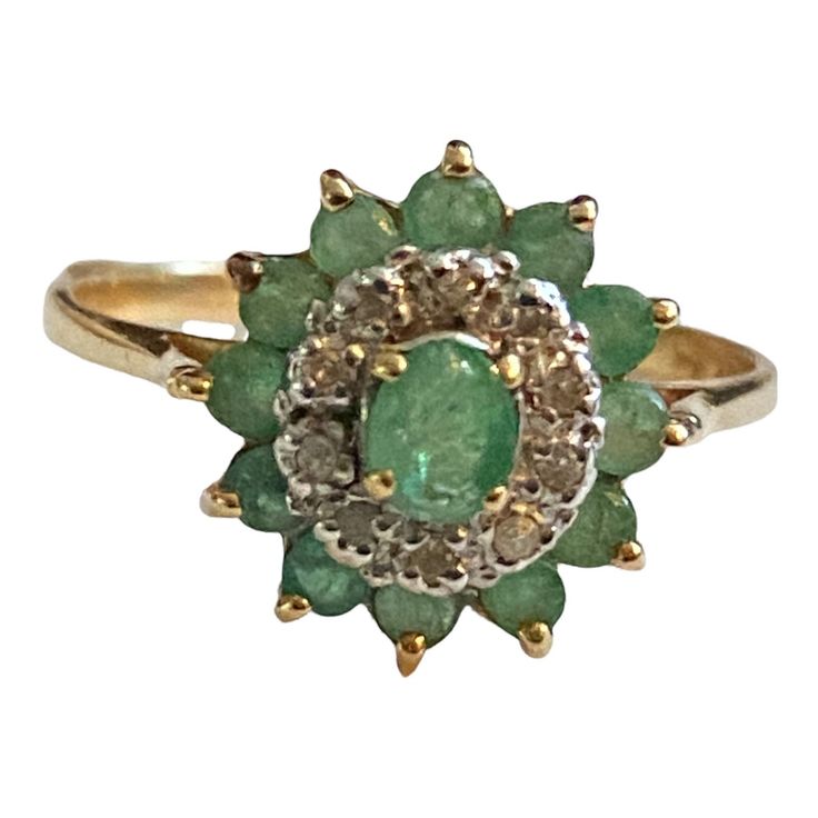 PRETTY 14K Yellow Gold EMERALD and DIAMONDS Halo Ring Size 7.25 Oval center .20ct emerald surrounded with a 10 - .02ct round diamond halo and a 12 - .03ct round emerald halo! .76 CTW Weighs 2.3 grams Hallmarked and tested 14k yellow gold In beautiful vintage condition, WOULD MAKE A GREAT GIFT!! Shipped FAST and FREE, fully insured in a gift box :) I guarantee item to be exactly as described and pictured.