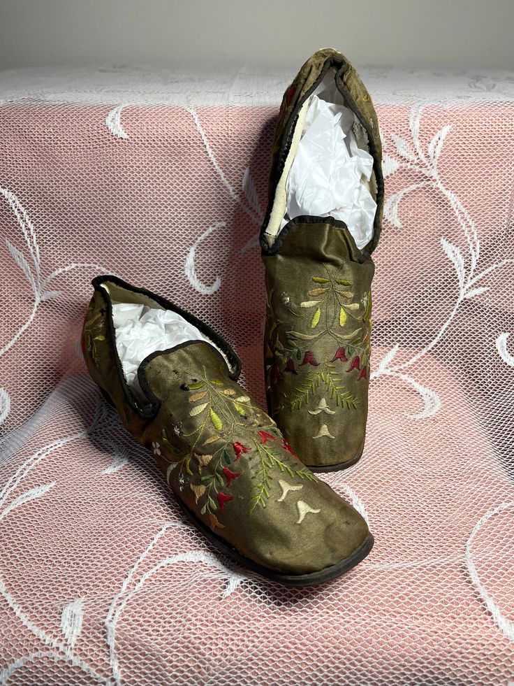 A wonderful pair of men's antique hand embroidered bronze satin shoes from 1820-1830's. These shoes have an antique square toe hand embroidered bronze satin shoes with black binding and low heels. Not perfect due to age and wear; damage to the leather soles and heels, some wear to the satin and embroidery, 3 small holes to the satin on one of the shoes, lightly soiled with the odd stain, but none of this takes away these wonderful shoes. Please take a close look at the pictures as they are part Victorian Men, Men Slippers, Satin Shoes, Old Shoes, Rare Antique, Hand Embroidered, 19th Century, Men's Shoes, Take That