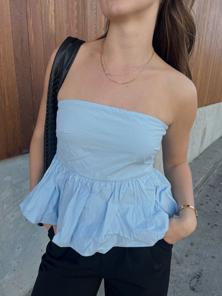 baby blue spring vibes bubble hem tube top true to size model wearing a size small Light Blue Tube Top Outfit, Trendy Strapless Tube Top For Spring, Blue Strapless Tube Top For Day Out, Casual Strapless Tube Top For Day Out, Blue Strapless Tube Top For Spring, Strapless Ruffled Tops For Day Out, Chic Blue Tube Top For Spring, Light Blue Bandeau Tube Top For Summer, Chic Blue Ruffled Tube Top