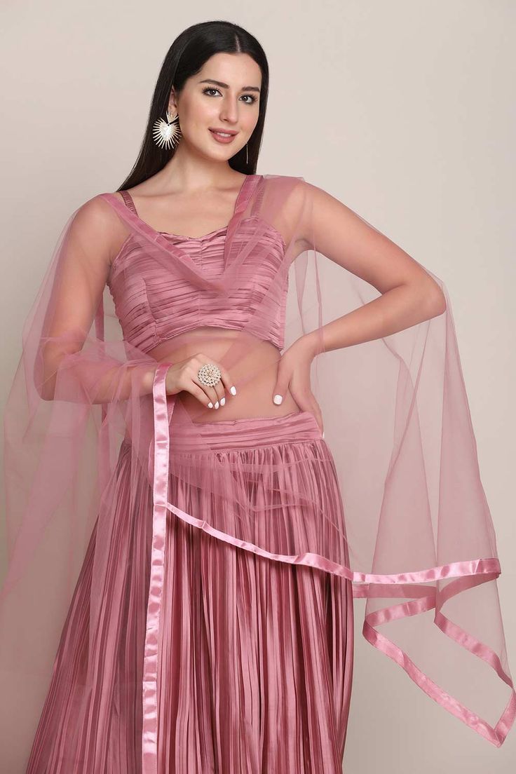 color-pink, fabric-silk, work-self design, brand-name-krupali-savani,occasion-festivewear, occasion-wedding-guest, womenswear,ideal-for-women, lehengas, Product Features: Color: Pink Lehenga Fabric: Satin Silk Choli Fabric: Satin Silk Work: Self Design Sleeves: Sleeveless Neck Type: V Neck Wash Care: Dry Clean Occasion: Festivewear, Wedding Guest Product Type: Lehenga Choli with Dupatta Disclaimer: There will be slight difference in digital to actual image Pink Organza Party Wear Pre-draped Saree, Formal Festive Set With Unstitched Blouse, Elegant Pink Chanderi Choli, Festive Pink Silk Pre-draped Saree, Elegant Chanderi Choli For Party, Silk Choli For Formal Eid Occasion, Traditional Drape Choli For Formal Occasions, Pink Silk Bollywood Pre-draped Saree, Formal Party Wear Choli