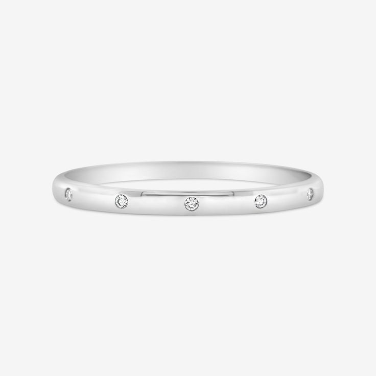 The Classic High Polished 5mm Bangle with special Burnished 5 Diamond Inlay details. An Iconic staple. Ready for you to Stack or wear Solo. Natural Diamonds: 0.40ctw 14K Yellow or White Gold Width: 5mm Size: 46 x 56 (Small - Medium) Hidden Clasp Timeless Stackable Diamond Bracelet For Everyday Luxury, Classic White Gold Bangle With Single Diamond, Formal Stackable Diamond Bracelet, Anniversary White Gold Diamond Bracelet In 14k, Classic Everyday Stackable Rings With Brilliant Cut, Classic Yellow Gold Bangle With Single Diamond, Classic Everyday Stackable Rings With Diamond Accents, Diamond Bracelet With Polished Finish, Timeless Stackable Diamond Bracelet