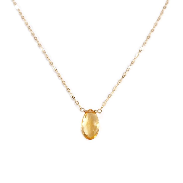 The dainty Citrine necklace features a single citrine gemstone for a simple look. Citrine is the November birthstone, and our version shows off the elegance of this yellow gemstone. Handcrafted in our San Francisco studio, the citrine birthstone necklace is available with 14k, gold fill or sterling silver chains..DETAILS- Genuine Citrine- Citrine size: approximately 9 mm by 6 mm- Made in gold filled, sterling silver or 14k solid gold- Adjustable chain 14" - 16", 16" - 18" or single size for 14k Orange Citrine Birthstone Necklace, Orange Citrine Gemstone Necklace, Amber Citrine Gemstone Necklace, Spiritual Citrine Amber Necklace, Elegant Amber Citrine Crystal Necklace, Elegant Amber Citrine Crystal Necklaces, Spiritual Citrine Birthstone Necklace, Amber Citrine Pendant Crystal Necklace, Amber Citrine Crystal Pendant Necklace