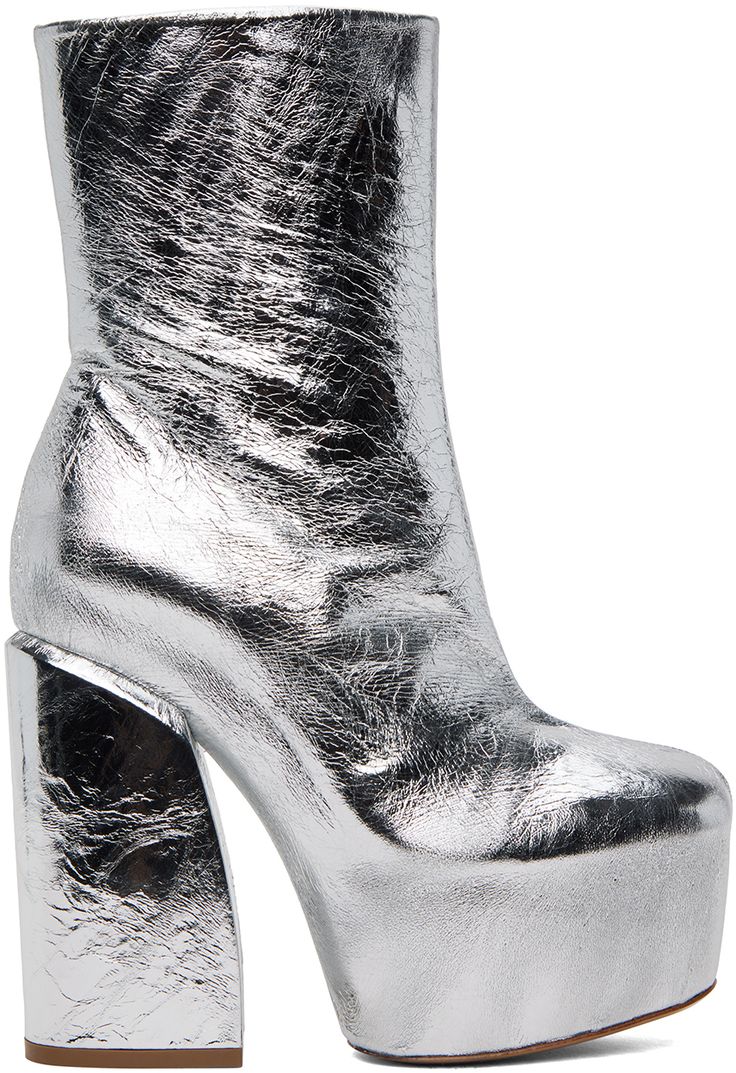 Ankle-high grained leather boots in metallic silver-tone. · Zip closure at inner side · Leather lining · Covered platform midsole · Covered block heel with rubber injection · Leather sole · Platform: H2.25 in · Heel: H5 in Supplier color: Silver Silver Platform Boots, Luxury High Heel Metallic Boots, Silver Ankle Boots With Reinforced Heel, Luxury Metallic High Heel Boots, Modern Platform Boots With Reinforced Heel For Party, Glamorous Platform Ankle Boots, Metallic High Heel Leather Boots, Silver High Heel Boots With Reinforced Heel, Silver Heeled Boots With Round Toe For Formal Occasions