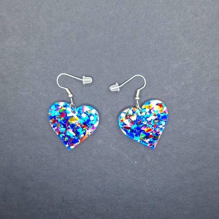 Confetti Glitter Acrylic Resin Shape Blue Is The Base Color Accompanied By Various Other Colors Heart Earrings Shiny Glam Magpie Jewelry New Conversation Pieces Pink Statement Piece Jewelry More Color Is This Design Listed Separately. Bundle To Get The Most On Shipping Pay One Price Shipping Up To 5lbs Blue Heart-shaped Earrings For Party, Blue Heart Charm Earrings For Valentine's Day, Blue Heart Earrings For Valentine's Day, Blue Earrings For Valentine's Day Party, Blue Heart-shaped Earrings With Heart Charm, Blue Glitter Jewelry For Party, Statement Piece Jewelry, Blue Confetti, Glitter Acrylic