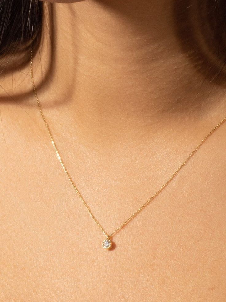 "This solitaire diamond necklace is made of 14k Solid Yellow Gold and round cut solitaire zircon stone. A dainty minimalist gold jewelry and cool piece combining perfect with daily outfits and a perfect gift for her :)  We can produce it in 14k Solid Yellow Gold, 14k White Gold or in 14k Solid Rose Gold, please choose from options list.  The \"Single Diamond Necklace\" has a round cut zircon pendant. We can produce it with real diamond as special order. Please contact with us via Etsy Message fo Minimalist Solitaire Necklace With Round Pendant, Fine Jewelry Solitaire Necklace With Brilliant Cut For Everyday, 14k Gold Solitaire Necklace With Delicate Chain, Everyday Fine Jewelry Solitaire Necklace With Diamond Cut, Everyday Fine Jewelry Solitaire Necklace In Diamond White, Everyday Fine Jewelry Solitaire Necklace With Single Diamond, Everyday Diamond Cut Solitaire Necklace, Everyday Fine Jewelry Solitaire Necklace With Brilliant Cut, Everyday Diamond White Solitaire Necklace