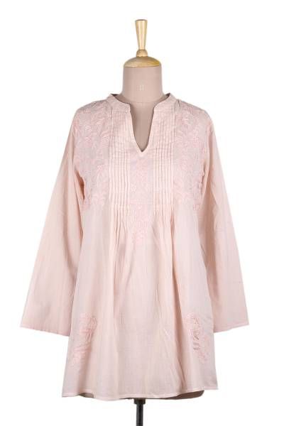 This long and feminine tunic is presented by Indian designer Shalabh. Crafted of cool soft cotton the blush pink blouse features an open V neckline pintucked bodice and lavish tone-on-tone chikankari hand embroidery. Long Tunics For Women Indian, Spring Feminine Blouse With Pintucks, Feminine Spring Blouse With Pintucks, Feminine Pintuck Top For Summer, Feminine Summer Top With Pintucks, Feminine Pintucks Top For Summer, Feminine Summer Tops With Pintucks, Feminine Spring Tops With Chikankari Embroidery, Spring Cotton V-neck Tunic