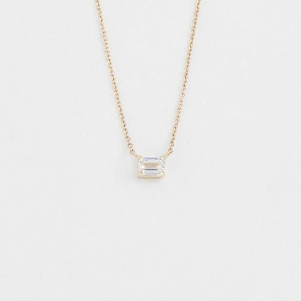 Our east west emerald cut pendant is a modern take on an everyday staple. Designed by Olivia Landau and made in NYC. Elegant Baguette Cut Emerald Necklace For Formal Events, Elegant Baguette Cut Emerald Necklace For Formal Occasions, Elegant Formal Baguette-cut Emerald Necklace, Modern Gold Emerald Cut Necklace, Elegant Emerald Necklace With Baguette Cut Diamond, Elegant Baguette Cut Diamond Emerald Necklace, Timeless Emerald Cut Diamond Necklace Gift, Timeless Rectangular Diamond Pendant Jewelry, Fine Jewelry With Emerald Cut Baguette Diamonds