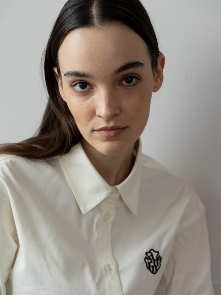 Composition : 100% cottonColor : BeigeCountry of Origin : Republic of Korea Classic Cotton Shirt With Embroidered Logo, Cotton Tops With Embroidered Logo And Collar, Summer Cotton Shirt With Embroidered Logo, Embroidered Cotton Shirt With Spread Collar, Cotton Embroidered Shirt With Spread Collar, Classic Embroidered Cotton Tops, Embroidered Relaxed Fit Shirt For Daywear, Relaxed Fit Embroidered Shirt For Daywear, Beige Embroidery