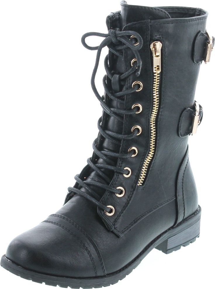 a pair of black boots with zippers on the side and gold hardware detail at the bottom