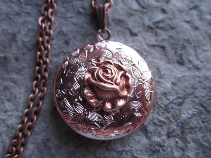 Beautiful rose gold plated round locket, I also have this in heart shaped, so please do browse my shop. AMAZING DETAILS The locket has been professionally plated with a gorgeous shiny pink 24k rose gold and an ultracoat has been added to protect finish and to add durability. The plating process has been done with high quality materials and processes. It is completely lead and nickel free and manufactured in the United States. The locket is Victorian style with beautiful etching on the front and Rose Gold Locket Necklace For Formal Occasions, Rose Gold Engraved Jewelry For Wedding, Engraved Rose Gold Jewelry For Weddings, Engraved Rose Gold Wedding Jewelry, Vintage Rose Gold Locket Necklace For Wedding, Elegant Rose Gold Locket Necklace For Valentine's Day, Rose Gold Engraved Necklaces For Wedding, Rose Gold Engraved Necklace For Wedding, Medallion Locket Necklace For Valentine's Day Wedding