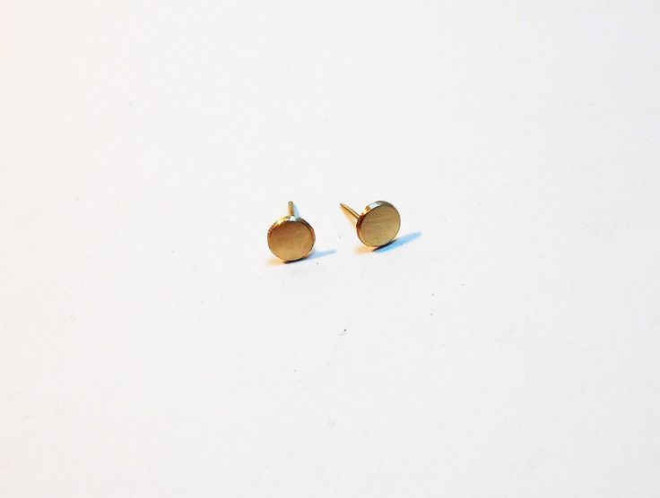 SIMPLE BEVELED-EDGE SOLID 14k GOLD STUD EARRINGS The earrings are forged, hammered flat and spun on a wheel to make a bevel edge. Photo 1 are: 7.0mm with Satin Finish. Photo 2 shows: (1 each) 4mm, 5mm, 6mm and 7mm earring with a Spiral Finish. Photo 3 are: 6mm with High Polish Finish. Photo 4 are: 7mm with Satin Finish. Photo 5 are: 7mm with High Polish Finish. (1) Choose from the drop down menu: Diameter sizes - 4mm, 5mm, 6mm, 7mm. (2 )Choose from the (2nd) drop down menu: Spiral finish as in P Gold Earrings For Everyday Wear, Gold Earrings Stamped 14k For Everyday Wear, Minimalist 14k Gold Round Earrings, Yellow Gold Round Plug Earrings For Everyday, Everyday Yellow Gold Round Plug Earrings, Minimalist 14k Stamped Earrings For Gift, Everyday 14k Stamped Yellow Gold Earrings, Nickel-free 14k Yellow Gold Earrings, Minimalist Yellow Gold Round Plug Earrings