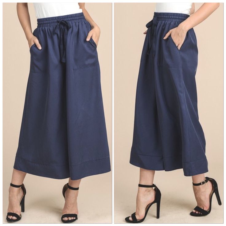 Restocked Amazing Quality. Model Wearing Actual Pants And They’re Not Altered In Any Way Ladies You’re Going To Fall In Love With These Pants. They’re Comfortable & Look Great On All Body Shapes. They’re Pants But At Times Look Like A Midi Skirt. They’ll Definitely Be Your Go To Pant. Dress Them Up Down & They Can Be Worn Through All Seasons Navy Blue 100% Tencel Elastic Waist Drawstring Super Wide-Leg Culotte Palazzo Trouser Cropped Pants With Side Pockets. Sizes Avail: Small, Medium & Large No Spring Denim Bottoms With Side Pockets, Spring Denim Blue Bottoms With Side Pockets, Chic Navy Bottoms For Fall, Blue Wide-leg Culottes For Spring, Casual Navy Wide Leg Pants With Pockets, Chic Wide Leg Pants With Pockets In Denim Blue, Blue Culottes For Spring, Chic Denim Blue Wide Leg Pants With Pockets, Denim Blue Pull-on Bottoms For Work